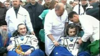 Soyuz capsule lands back on Earth