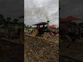 All women crew plowing with a 25hp Russell traction engine.