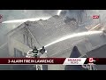 Firefighter injured battling Lawrence blaze