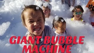 FOAM PARTY! Giant piles of bubbles you get to play in! Eli and Rachel dive in!