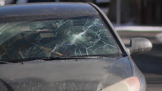 Man arrested after allegedly smashing windshields with large rocks