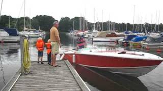 Magnum 27 Sport leaving the dock.