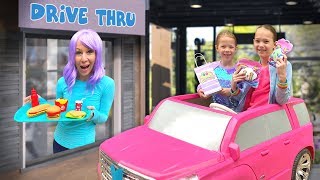 Collecting Uni-Verse Toys at the Pretend Drive-Thru