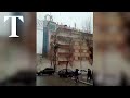 Moment building collapses in Turkey after earthquake