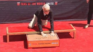 Stan Lee Adds Handprints to Grauman’s Chinese Theater Concrete in Ceremony