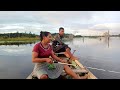 pescaria com frito de pirarucu no molho de tucupi na beira do rio na amazÔnia