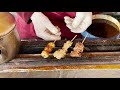 yakitori chicken skewers in tokyo s ueno park japanese street food 焼き鳥