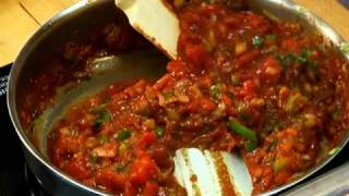 Oysters Etouffee over stone-ground grits