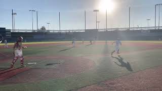 Marco Cooper hitting a double to score Lavin A. In