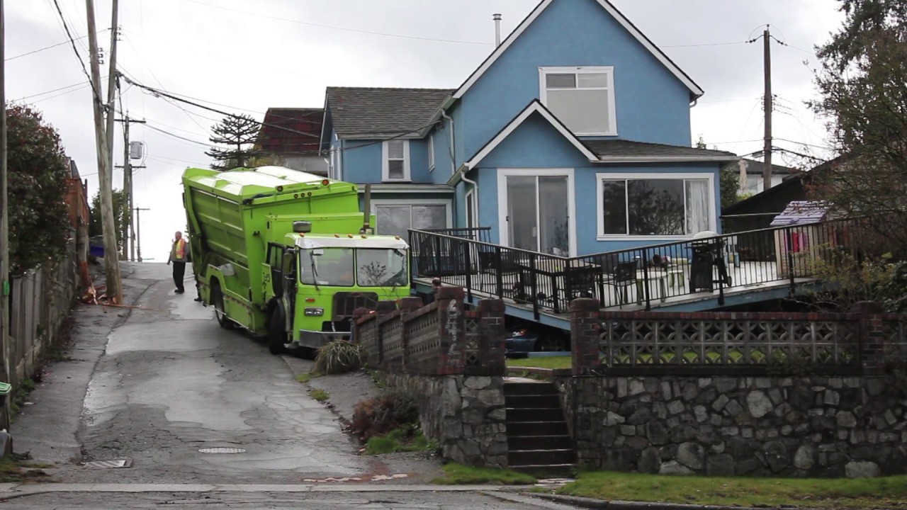 Out Of Control Garbage Truck Crashes Into House - YouTube