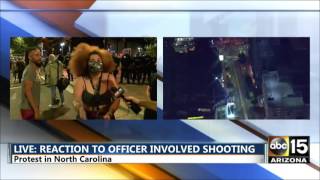 Watch woman RUN from COPS - Charlotte NC Protest - Officer involved shooting - Black lives matter