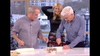 Holly Willoughby gets ‘DEMOTED’ live on This Morning after giant sausage roll gaffe