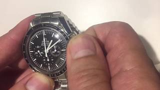 Dando cuerda a un Omega Speedmaster