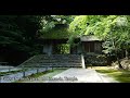 the unusual thatched gate with its remote atmosphere seems to symbolize a dignified old temple.