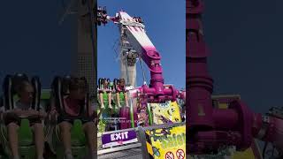 Mom frustrated as young children stuck upside-down on carnival ride