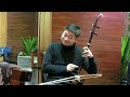 chinese violinist shar yi plays the erhu