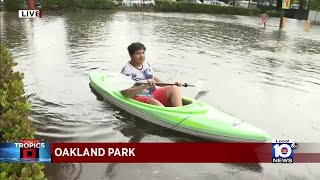 Two brothers in Oakland Park take advantage of the flooding