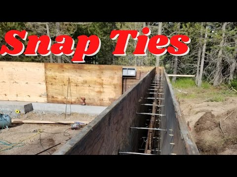 CONCRETE FOUNDATION WALLS WITH SNAP TIE FORMS CONCRETE FOUNDATION WALLS WITH SNAP TIE FORMS