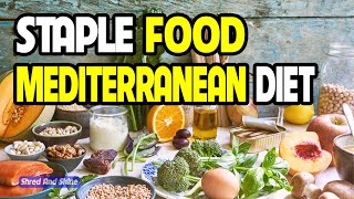 What is the staple food of the Mediterranean Diet?