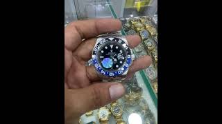 Relógio Masculino Rolex Automático GMT Master II prata com preto bisel misto azul