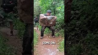 Lifting an impossibly heavy stone! 😮💪  -  🎥 travel_liftstones_repeat