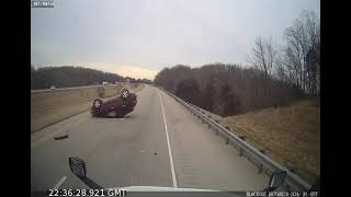 AMEXPRESS 1056 F 20220308 223535 car rolls over hitting guard rail