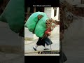 defying time 70 year old woman carries heavy load with ease proving age is just a number courage