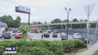 Man injured in officer-involved shooting at Marietta motel