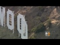 lapd not amused as man climbs hollywood sign