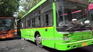 Safdarjung Bus Terminal - Frontline workers ensure Covid safety measures while boarding public bus