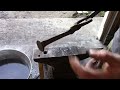 forging a split cross from a railroad spike