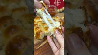 That cheese pull though 🫠 #shortsvideo #cookingchannel  #cheesy #festive  #appetizer #holidayfood