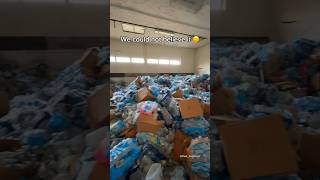 We found THOUSANDS of unopened water bottles inside an abandoned school in Flint Michigan 😕