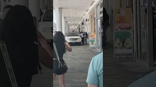 Woman drives SUV through doors, into Mass. shopping mall
