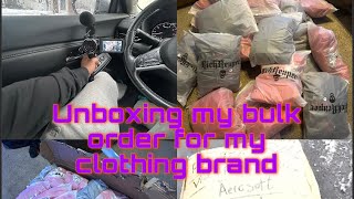 Unboxing my bulk order for my clothing brand