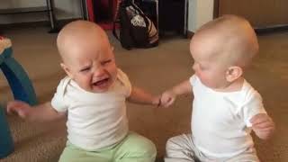 Twin baby girls fight over pacifier ( music by @zoibafmusic )