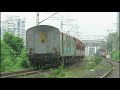 twin gooty emds swiftly passing through lush greenery hauling 16588 bikaner yesvantpur express