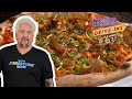 Guy Fieri Tries a Kimchi and Korean Sausage Pizza | Diners, Drive-Ins and Dives | Food Network