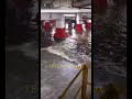 Tesla leaving Flooded parking garage