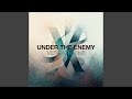 UNDER THE ENEMY