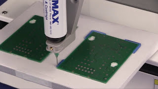 Dispensing robot applying UV curing adhesive to pcb