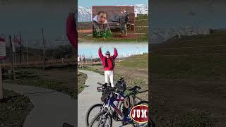 Jumping For Joy On A Cold Snow Capped Mountain Day