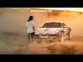 Dashing across the dunes in a Porsche 911 Dakar