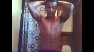 Ripped teen flexing back, biceps and triceps