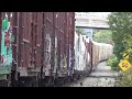 nice fall colours long freight train cn 507 rolling thru downtown moncton nb at good speed