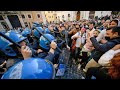 Italian protesters scuffle with police over Covid restrictions