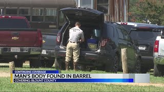 4 in custody for questioning in connection with body found in metal canister