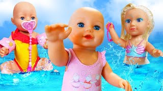 Baby Annabell doll. Kids play dolls at the beach. Baby doll morning routine. Baby born doll videos.