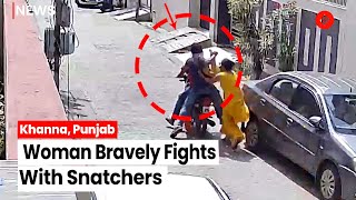 Woman Bravely Fights With Snatchers, Incident Caught On CCTV Camera
