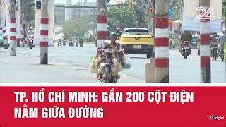 TP. Hồ Chí Minh: Gần 200 cột điện nằm giữa đường | VTV24